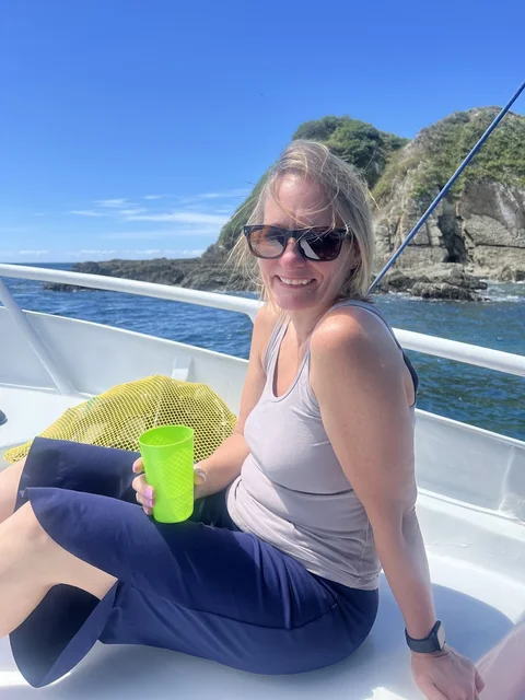 A Casa Cascada guest on a whale-watching boat trip off the coast near Uvita, Costa Rica