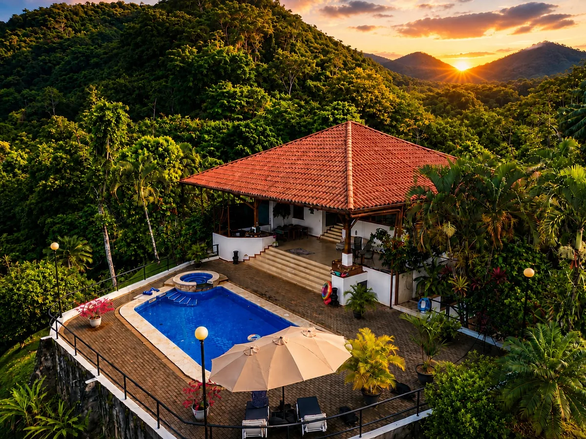 Mountains and jungle along the Costa Ballena coastline lit by golden-hour light
